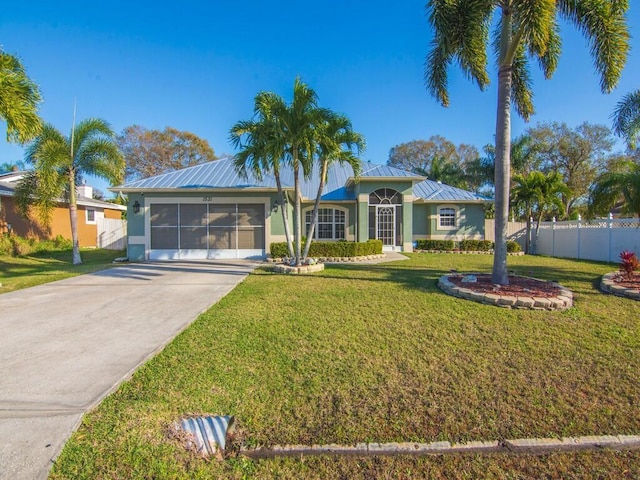 single story home with a front lawn