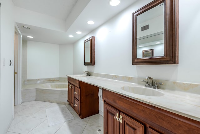 bathroom with vanity and a bathing tub