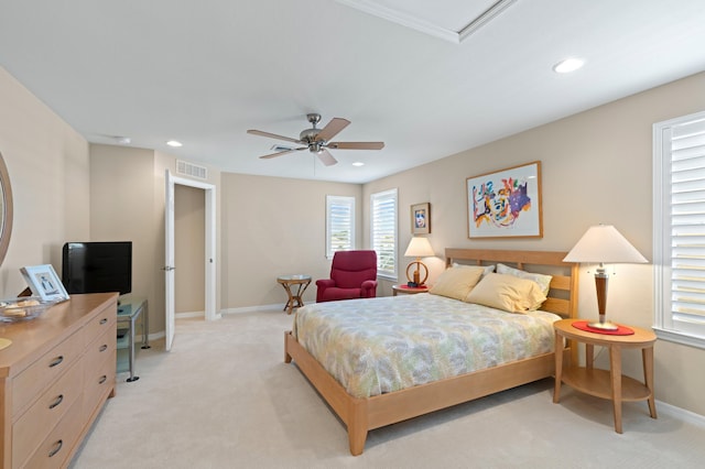 bedroom featuring ceiling fan, recessed lighting, light colored carpet, visible vents, and baseboards