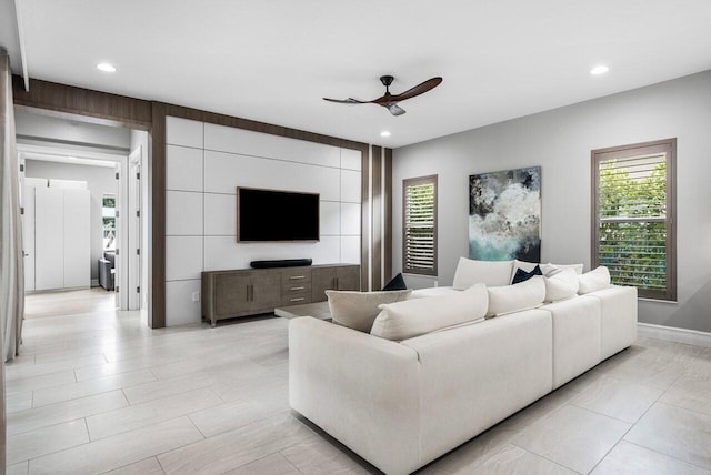 living room with ceiling fan