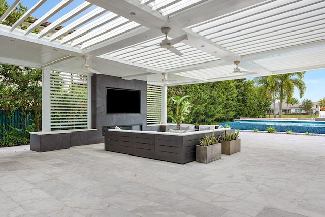 view of patio featuring a pergola, outdoor lounge area, and ceiling fan