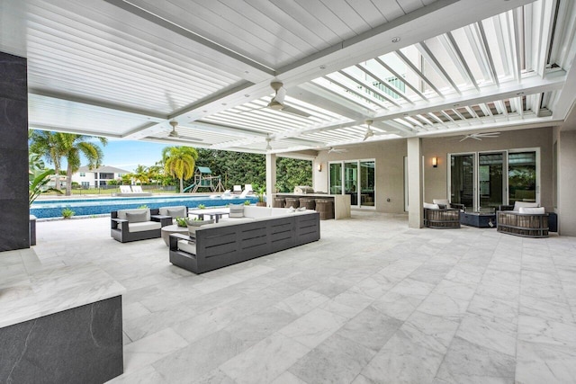 view of patio featuring a playground, outdoor lounge area, area for grilling, and ceiling fan