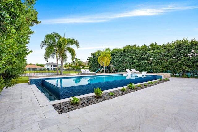 view of pool with a patio area