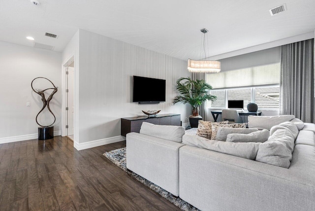 living room featuring dark hardwood / wood-style floors