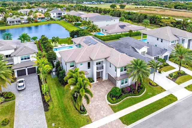 bird's eye view with a water view