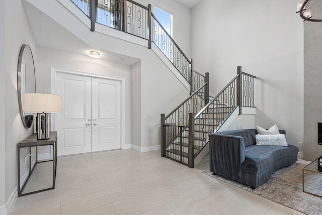 foyer featuring a high ceiling