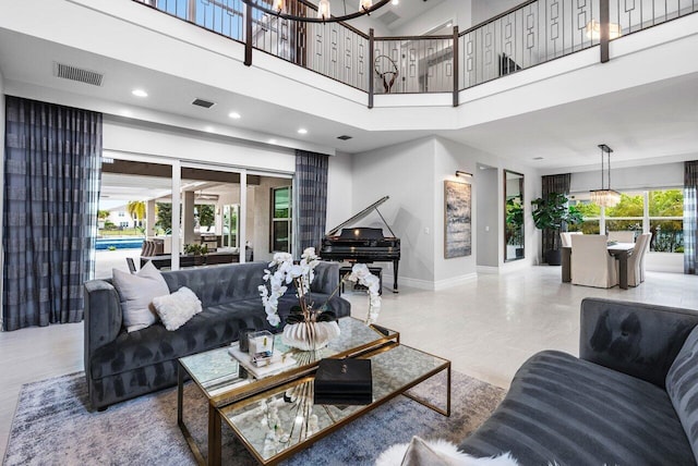 living room with a towering ceiling