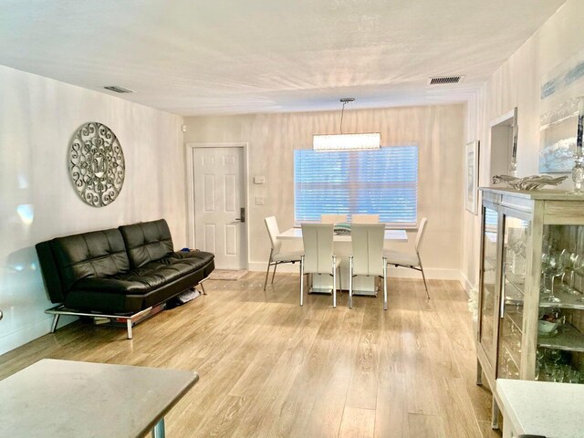 bedroom featuring light hardwood / wood-style flooring and ceiling fan