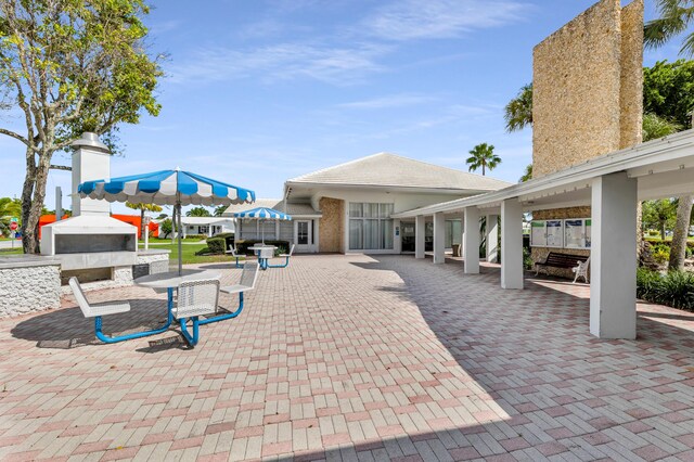 view of patio featuring an outdoor kitchen