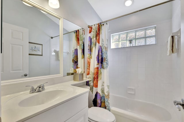 full bathroom featuring vanity, toilet, and shower / bath combo with shower curtain