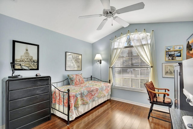 bedroom with vaulted ceiling, dark hardwood / wood-style floors, and ceiling fan