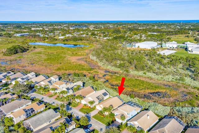 drone / aerial view featuring a water view