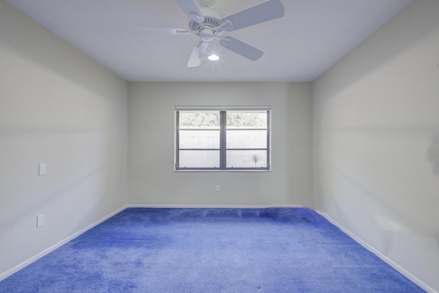 spare room with ceiling fan and carpet flooring