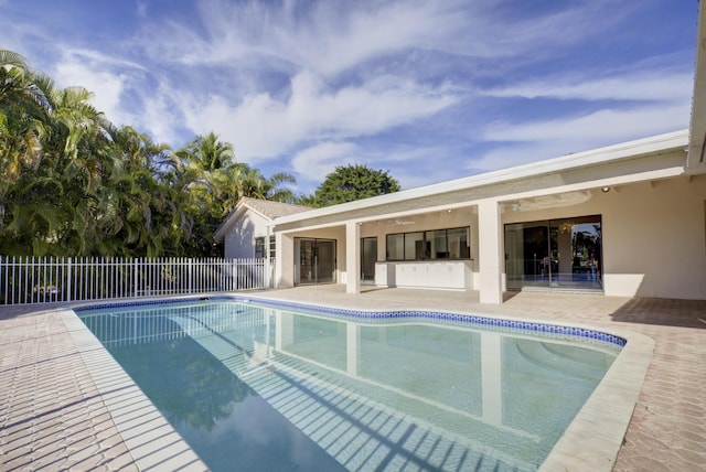 view of swimming pool featuring a patio