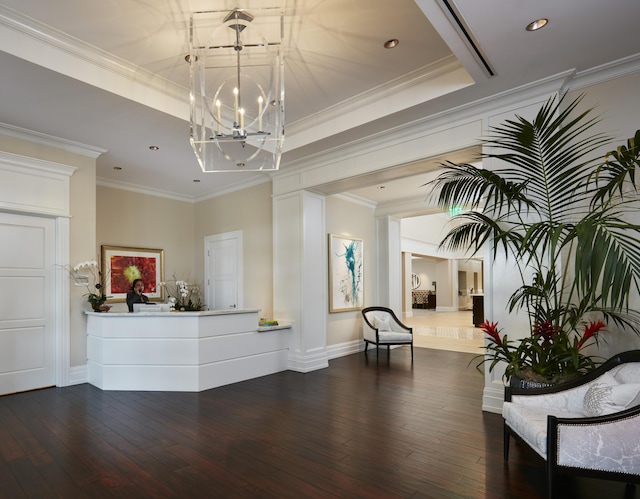 reception area featuring a chandelier