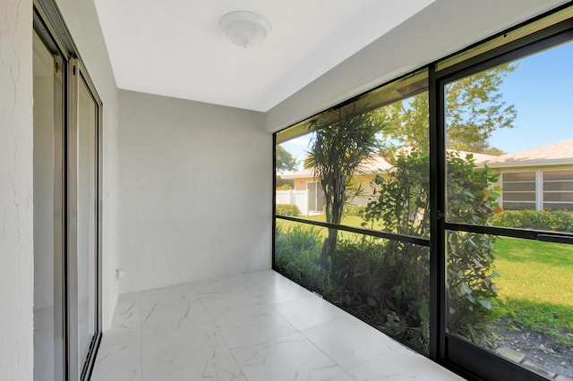 view of unfurnished sunroom