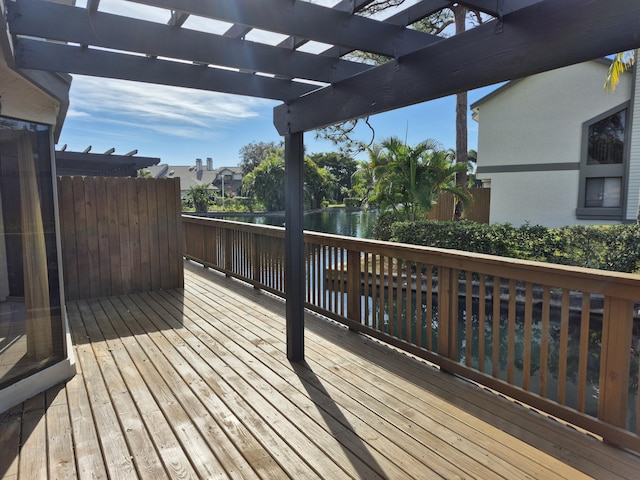 wooden terrace with a water view