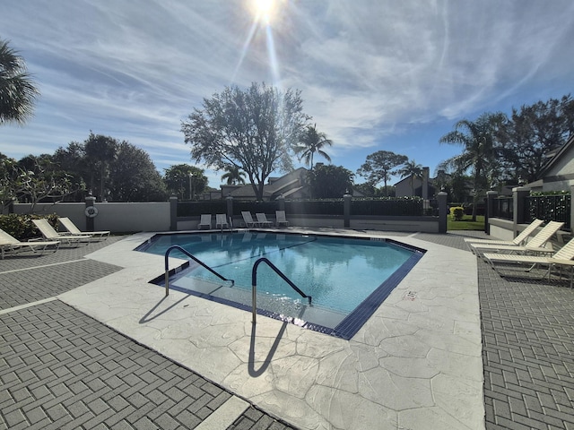 view of pool featuring a patio area