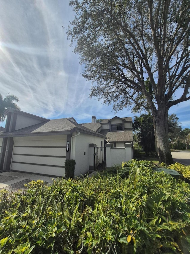 view of front of property featuring a garage