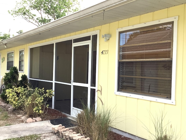 exterior space with a sunroom