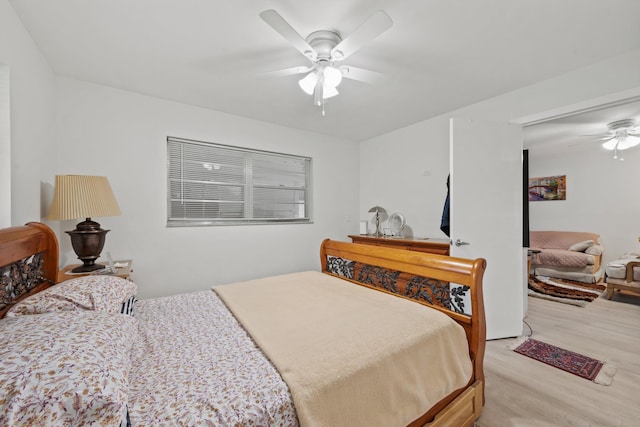 bedroom featuring ceiling fan and light wood-type flooring