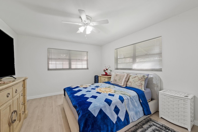 bedroom featuring ceiling fan and light wood-type flooring