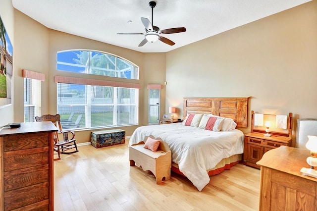 bedroom featuring ceiling fan and light wood-type flooring