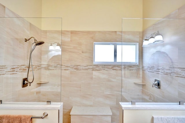 bathroom featuring tiled shower