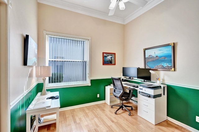 office space featuring ornamental molding, ceiling fan, and light hardwood / wood-style flooring