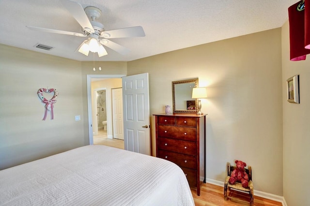 bedroom featuring ceiling fan and light wood-type flooring