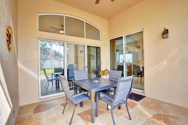 dining room featuring ceiling fan