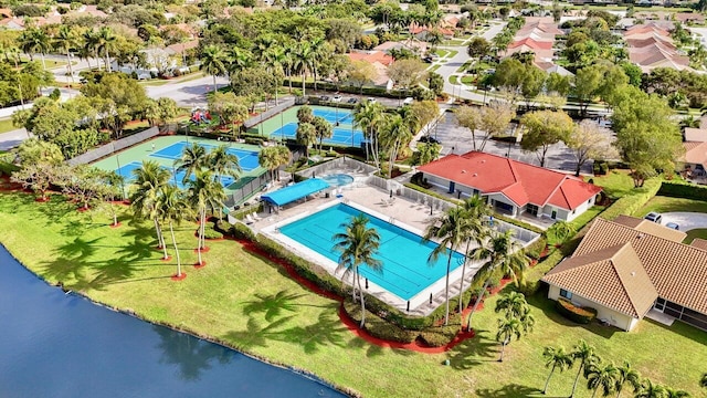 birds eye view of property featuring a water view