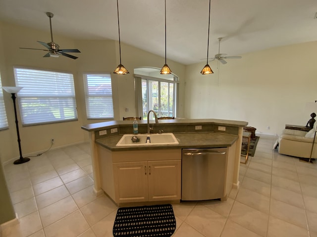 kitchen featuring a kitchen island with sink, sink, light tile patterned floors, and dishwasher