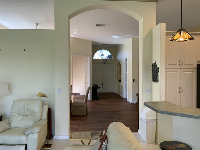 hall with light wood-type flooring