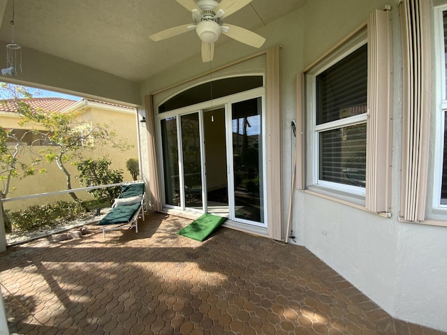 view of patio / terrace featuring ceiling fan