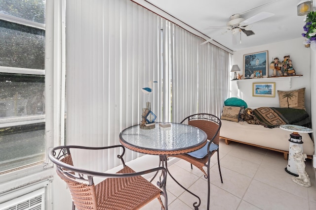 sunroom / solarium with ceiling fan