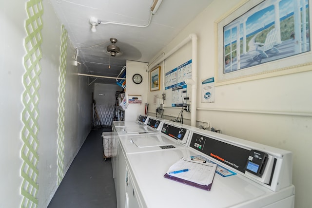 washroom featuring washing machine and clothes dryer