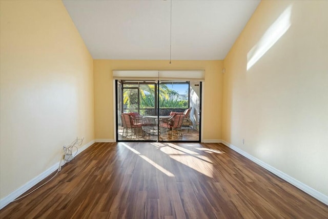 unfurnished dining area featuring dark hardwood / wood-style flooring