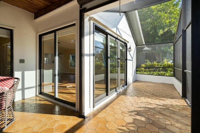 doorway to outside featuring wooden ceiling