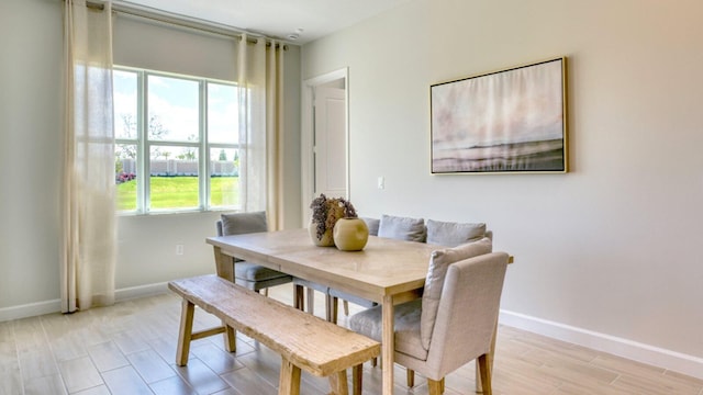 dining room with light wood-type flooring