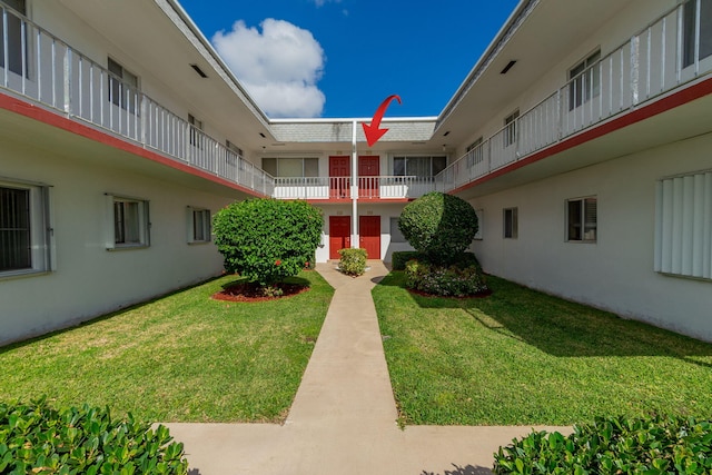 surrounding community featuring a yard