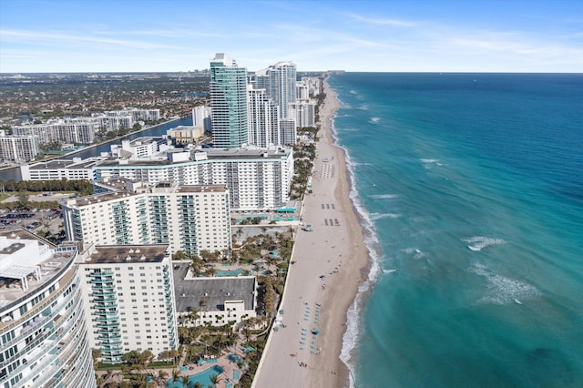 bird's eye view with a view of the beach and a water view