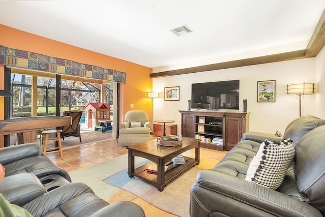 living room featuring light tile patterned flooring