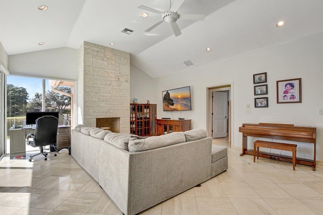 living room featuring a stone fireplace, vaulted ceiling, and ceiling fan