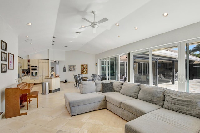 living room featuring lofted ceiling and ceiling fan