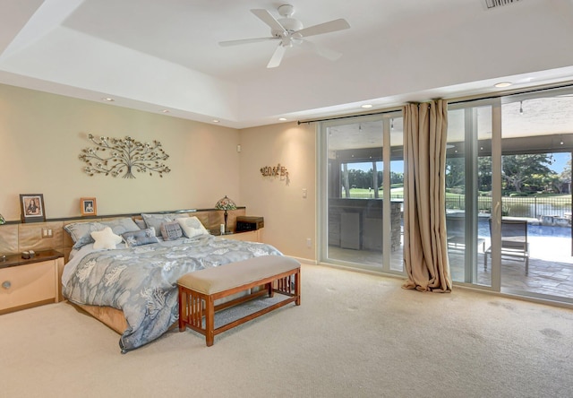 carpeted bedroom with access to outside and ceiling fan