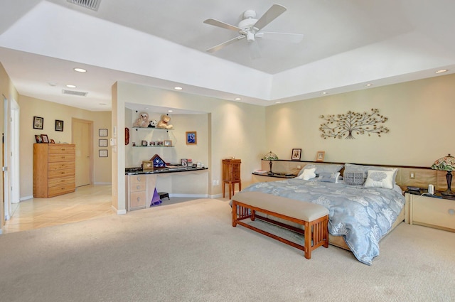 bedroom with light carpet and ceiling fan