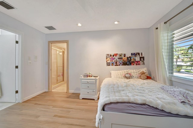 bedroom featuring light hardwood / wood-style flooring