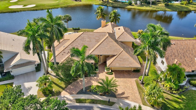 bird's eye view with a water view