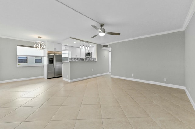 unfurnished living room with light tile patterned floors, crown molding, and ceiling fan with notable chandelier